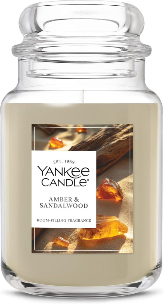 Yankee Candle Amber & Sandalwood, Scented Candle, 22oz Large Jar with up to 150 Hour Burn Time